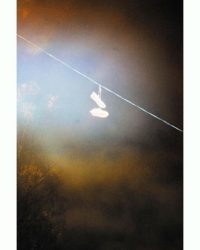 white skateboard shoes on a telephone wire marking the spot where the seatrout lurk 😇